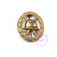 Нагрудный знак за ранение золотого цвета ПМВ