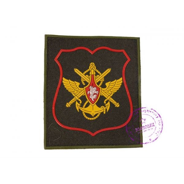 Нарукавный знак должностных лиц органов военного управления МО РФ с красным кантом